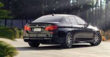 Black BMW M5 with Modulare B14 21x9, 21x10.5 staggered wheels